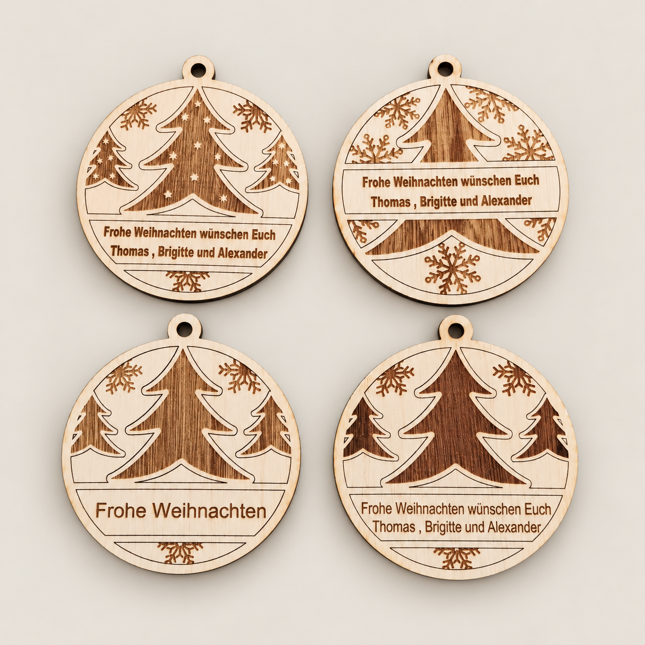Vier persönliche Weihnachtsanhänger – Produkt von RT LASERGRAVUR